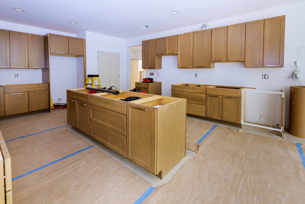 What are the disadvantages of wood kitchen cabinets